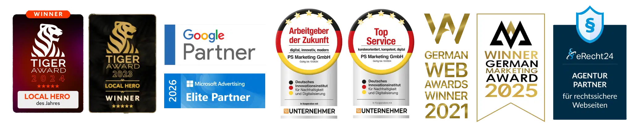 Übersicht der Klickrebellen Auszeichnungen und Partner-Siegel 2021–2026, darunter Tiger Award 2024 Local Hero, Google Partner, Microsoft Advertising Elite Partner 2026, Arbeitgeber der Zukunft, Top Service, German Web Awards Winner 2021, German Marketing Award 2025 Winner und eRecht24 Agentur Partner.